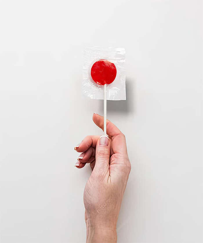 Individually Wrapped Fruit Flavored Lollipops - Assorted 4 Individually Wrapped Fruit Flavored Lollipops - Assorted